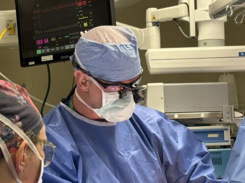 thoracic surgeon performing lung resection