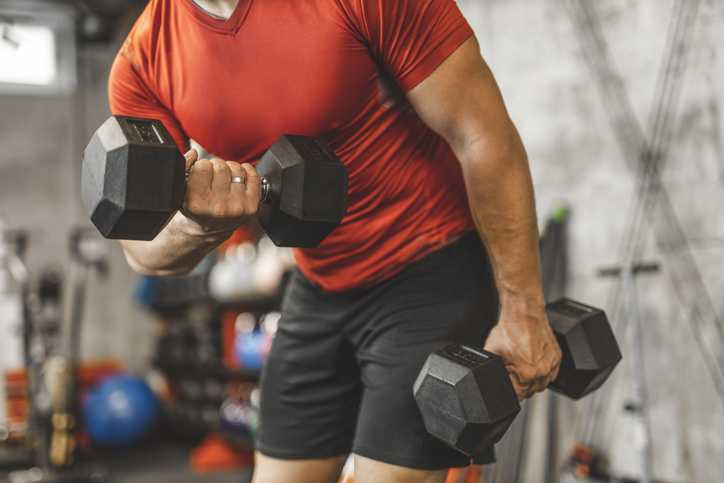 man bicep curling