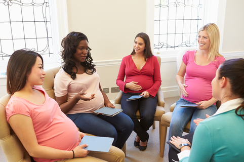 Pregnant Women Engaging in Meeting At Ante Natal Class