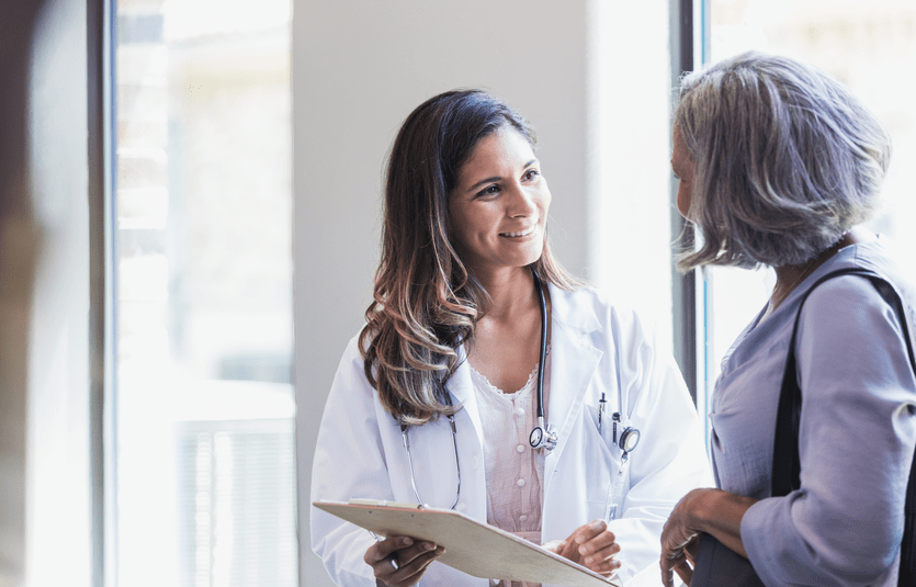 patient meeting with women's health provider