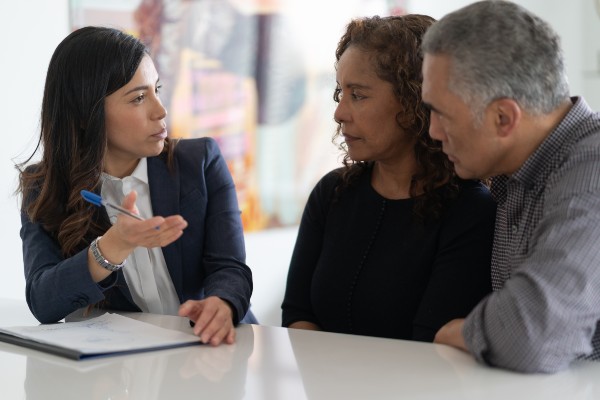 Senior couple with financial advisor