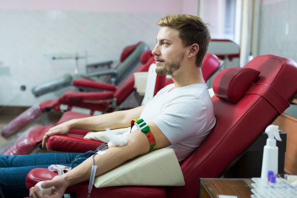 Man donating blood and plasma