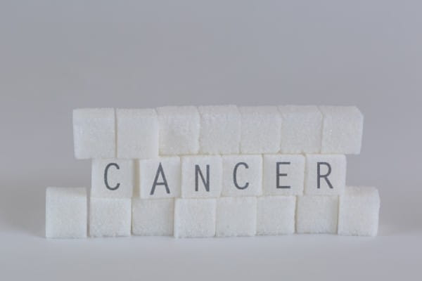cancer spelled out on sugar cubes