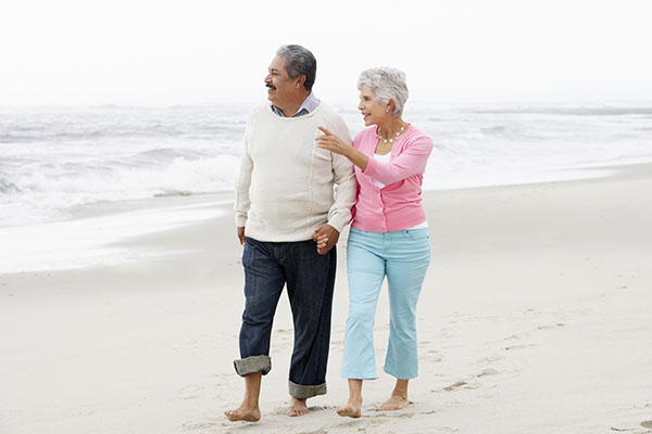 Couple walking on beach