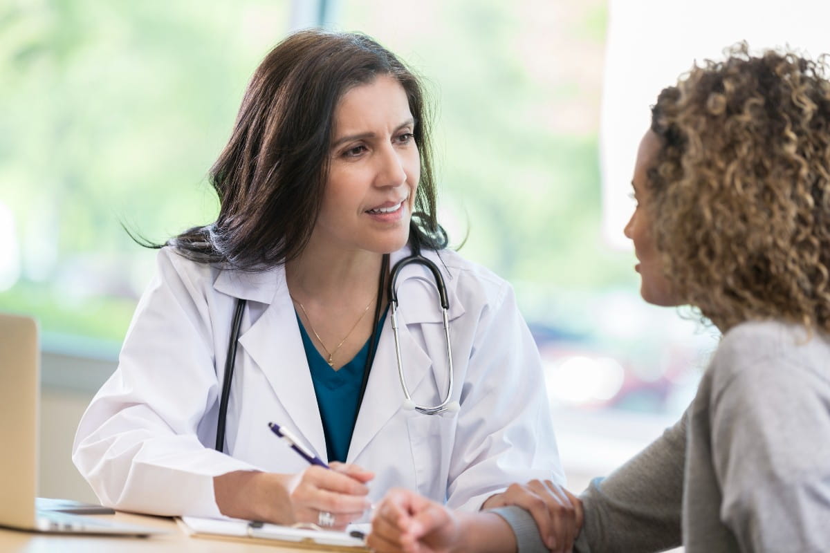 Doctor talking to patient