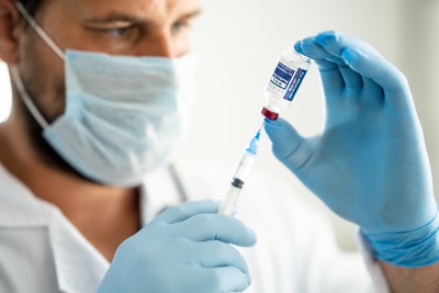 Doctor with vaccine