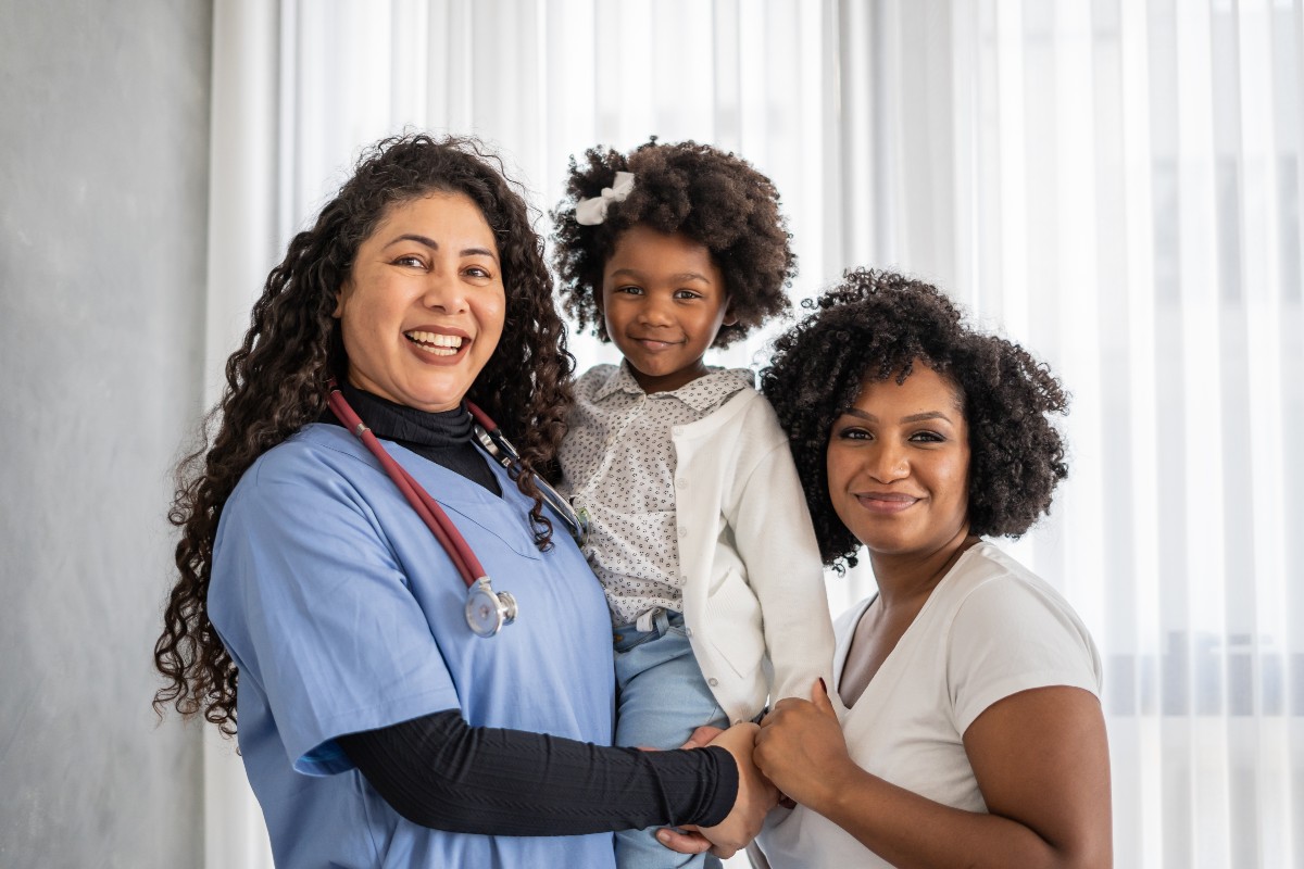 FNP with patient and daughter