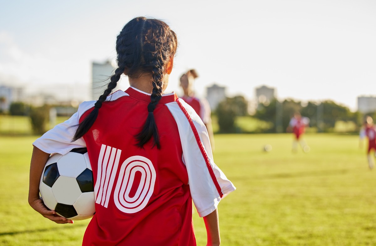 Girl playing soccer