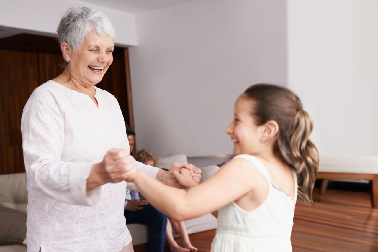 Grandma dancing with grandkid