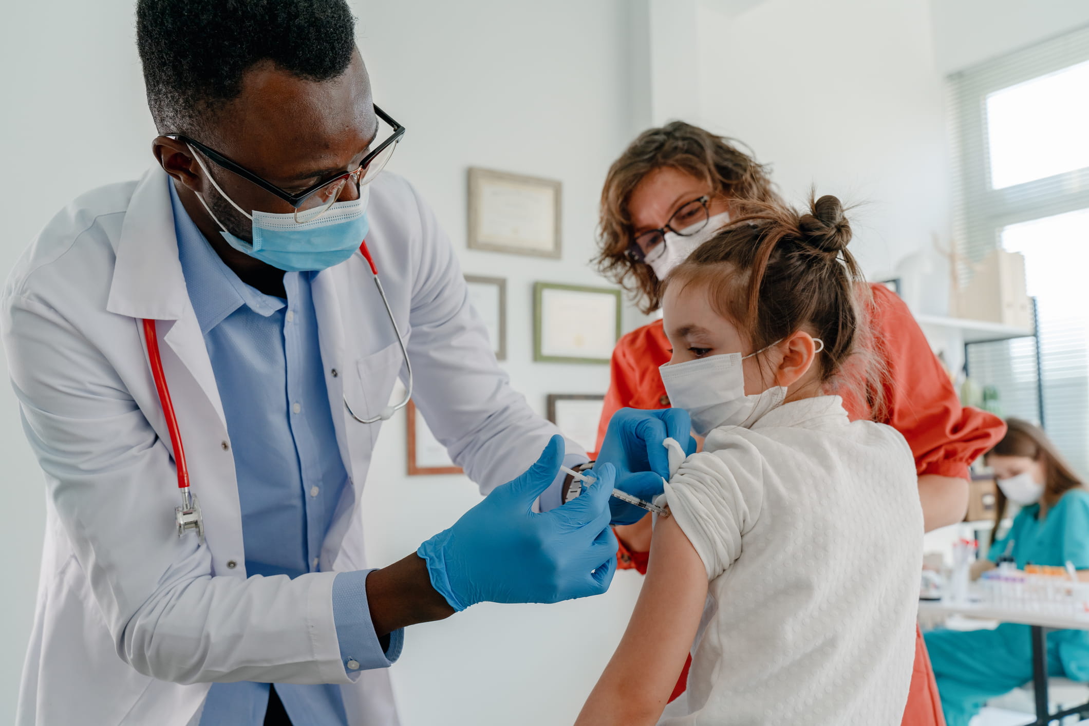 Children getting vaccine shot