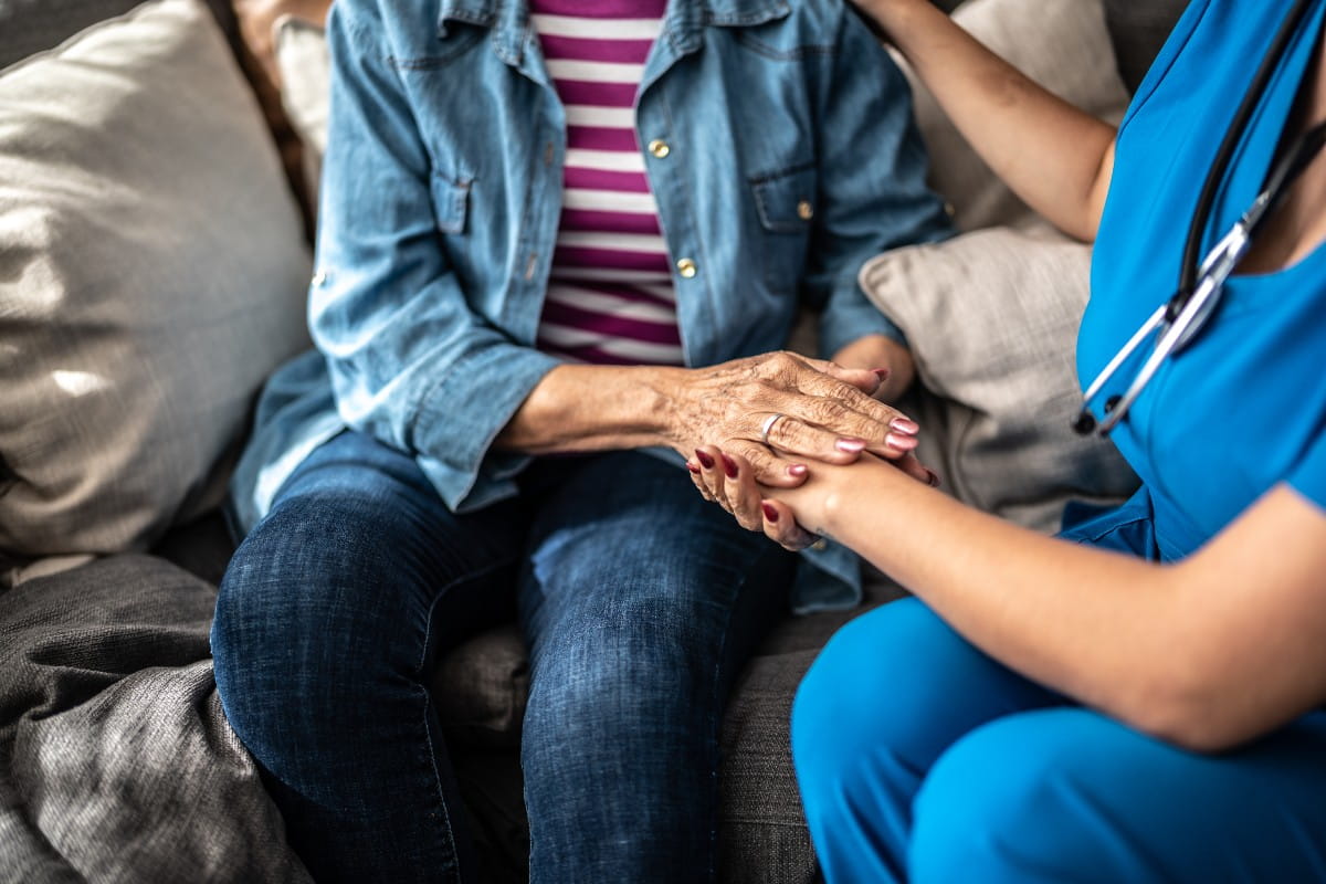 Nurse with older patient