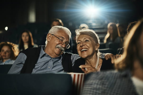Older-white-couple-in-movie-theater