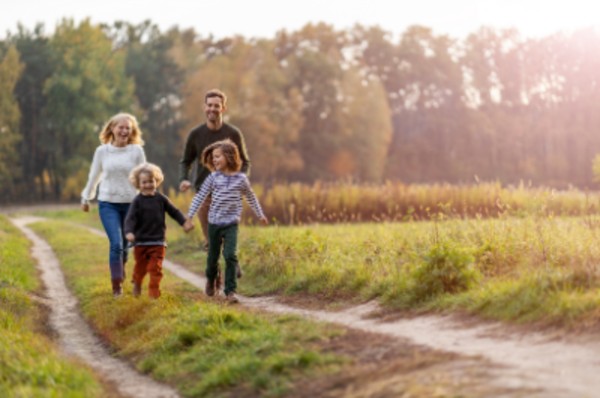 Young family walking outside