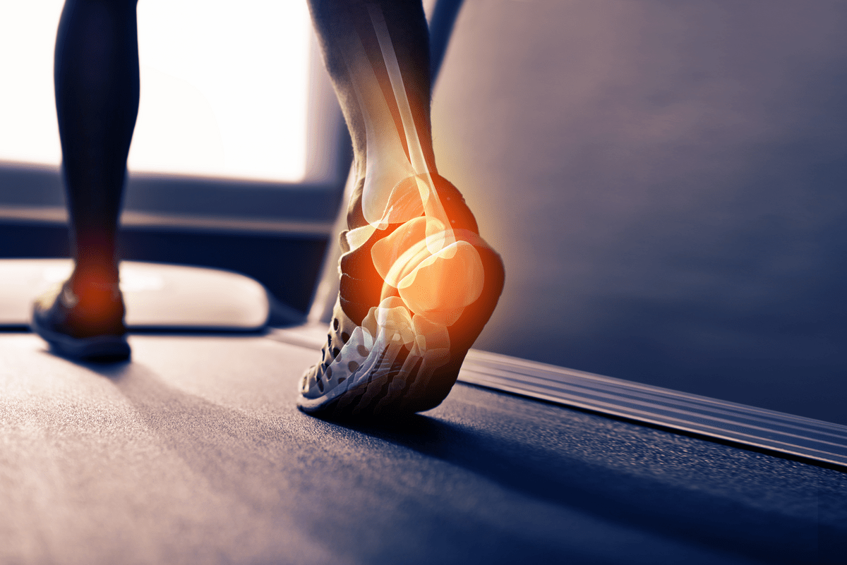Rear view shot of the highlighting the ankle joints in a runner's foot