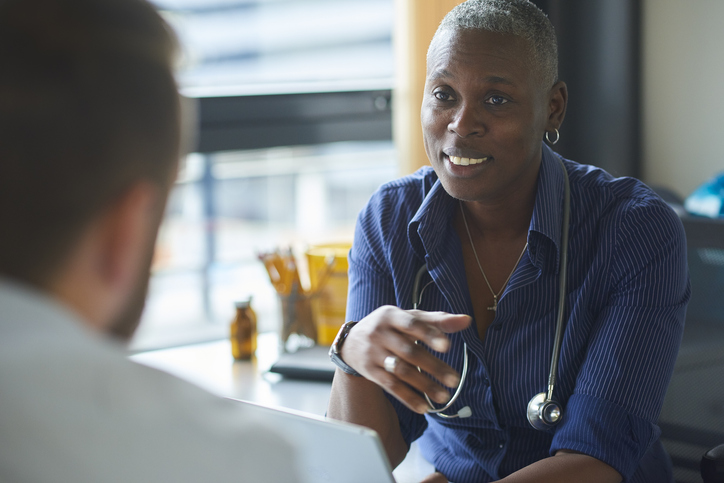 Female doctor consulting with a patient