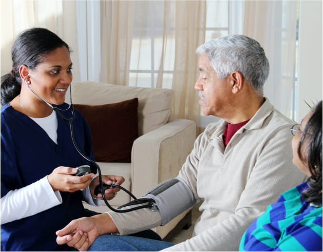 doctor helping older patient